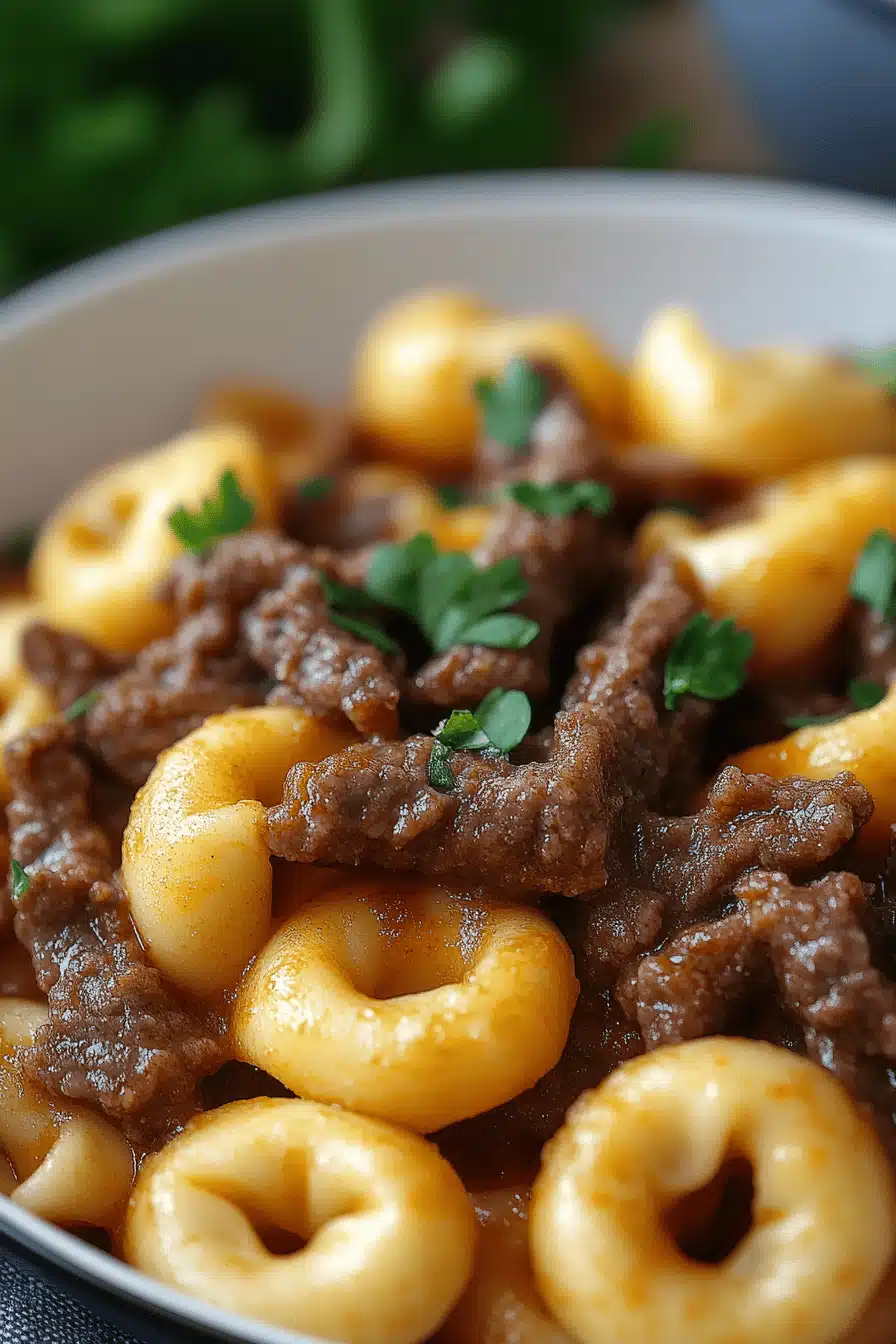 Cheesesteak Tortellini Recipe ingredients organized and measured on kitchen counter