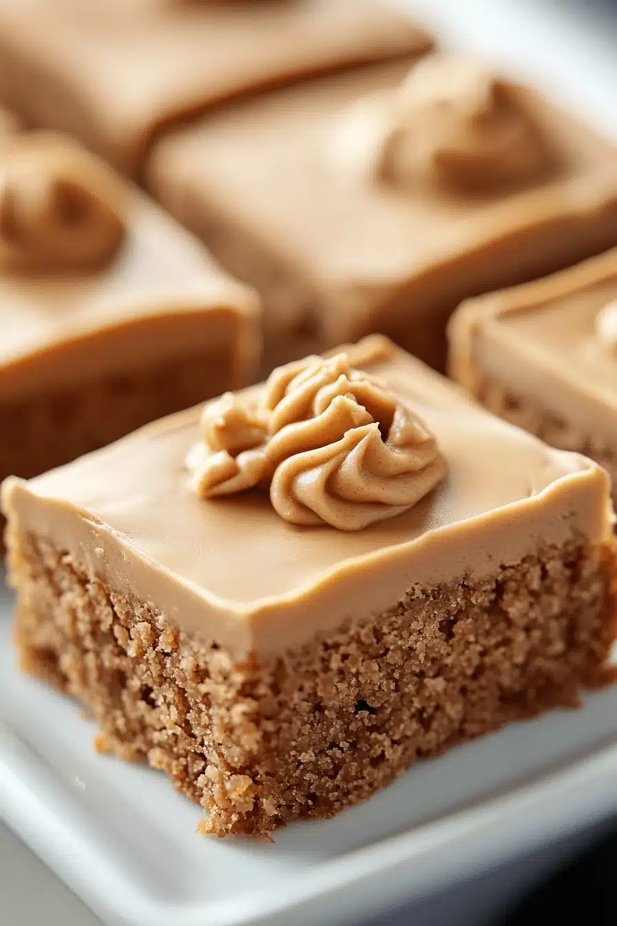 Peanut Butter Sheet Cake slice on plate showing perfect texture and swirl pattern