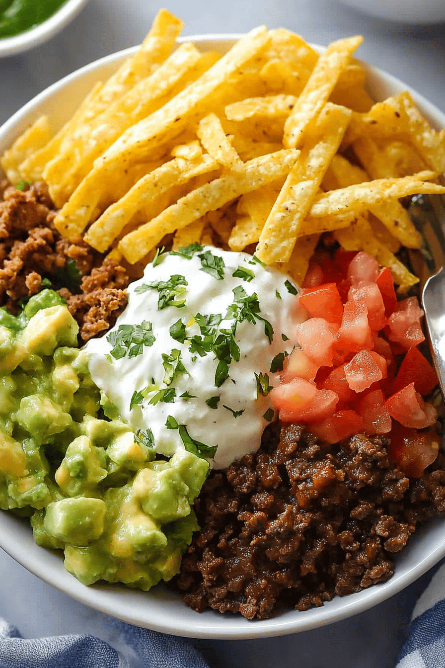 Burrito Bowl Recipe ingredients organized and measured on kitchen counter