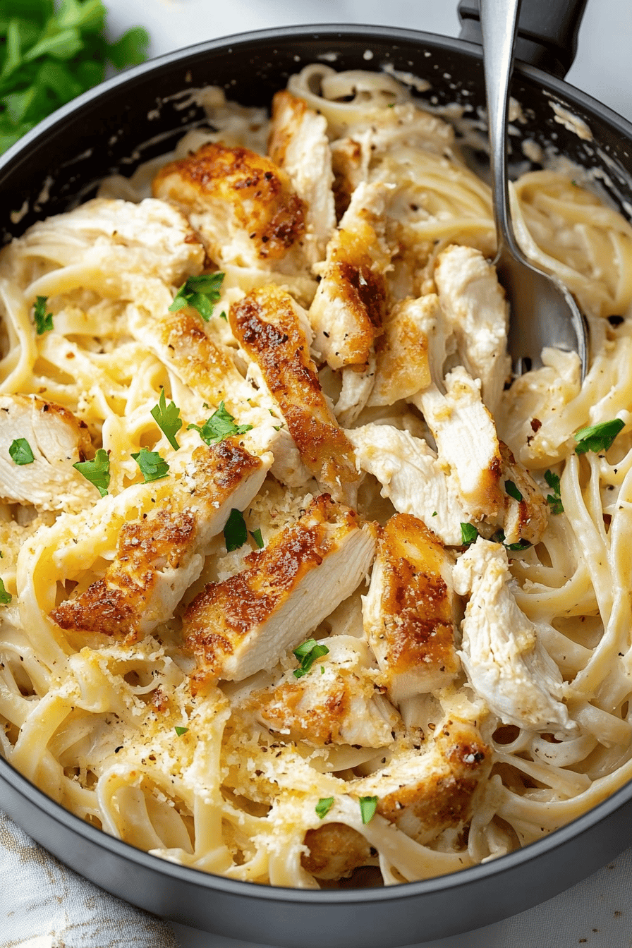 Chicken Alfredo Pasta slice on plate showing perfect texture and swirl pattern