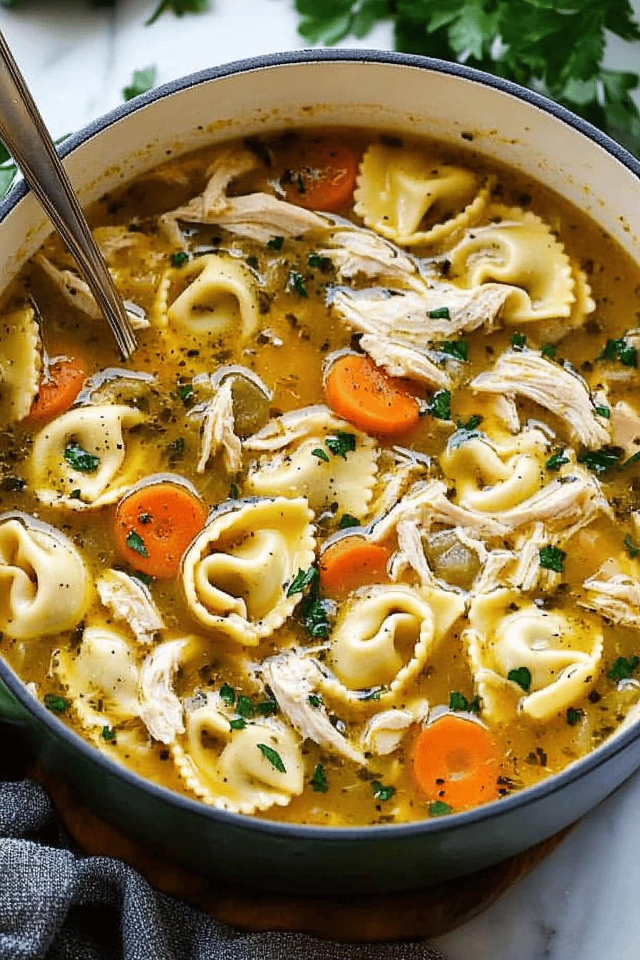 Chicken Tortellini Soup Recipe ingredients organized and measured on kitchen counter