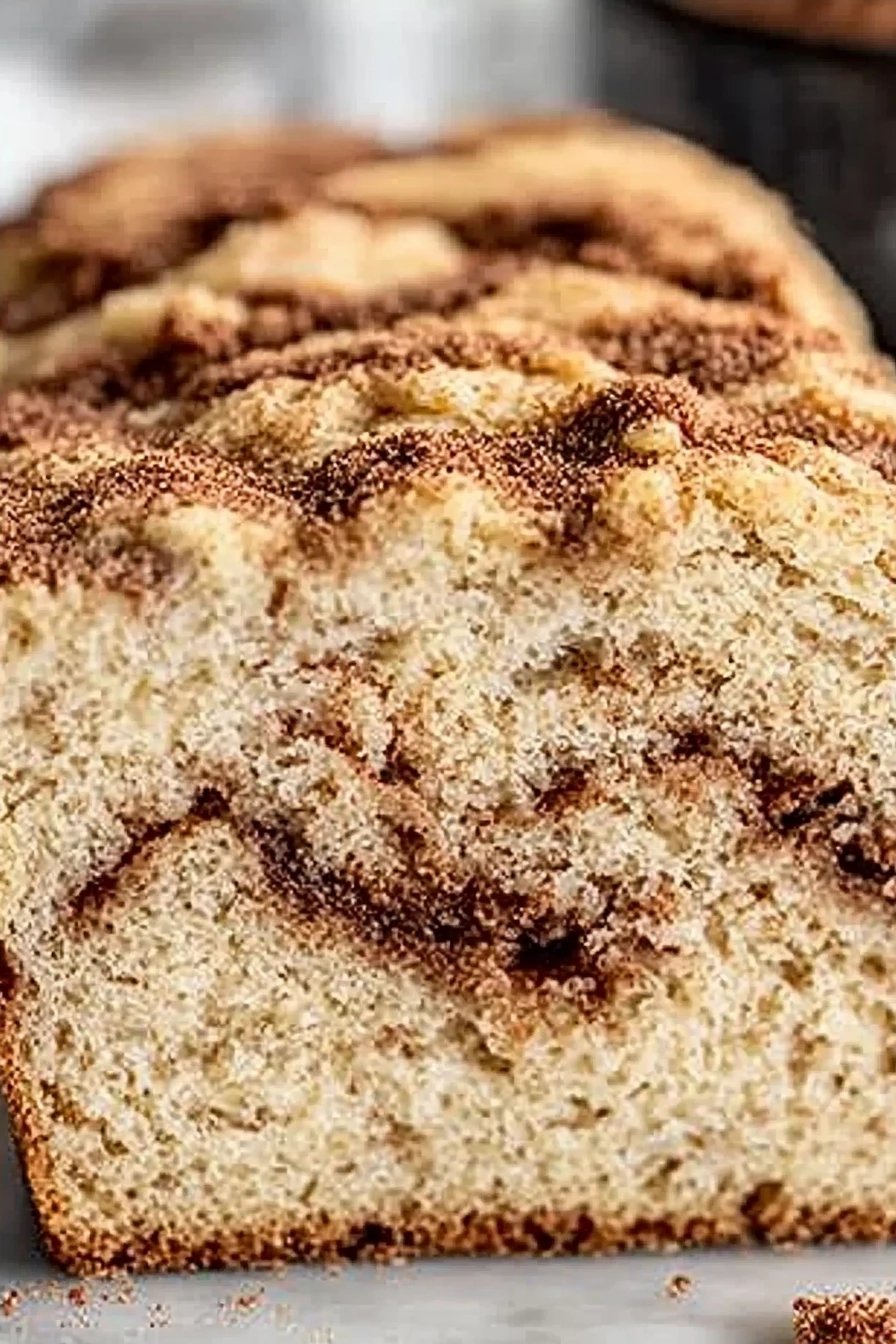 Cinnamon Swirl Gluten-Free Bread slice on plate showing perfect texture and swirl pattern