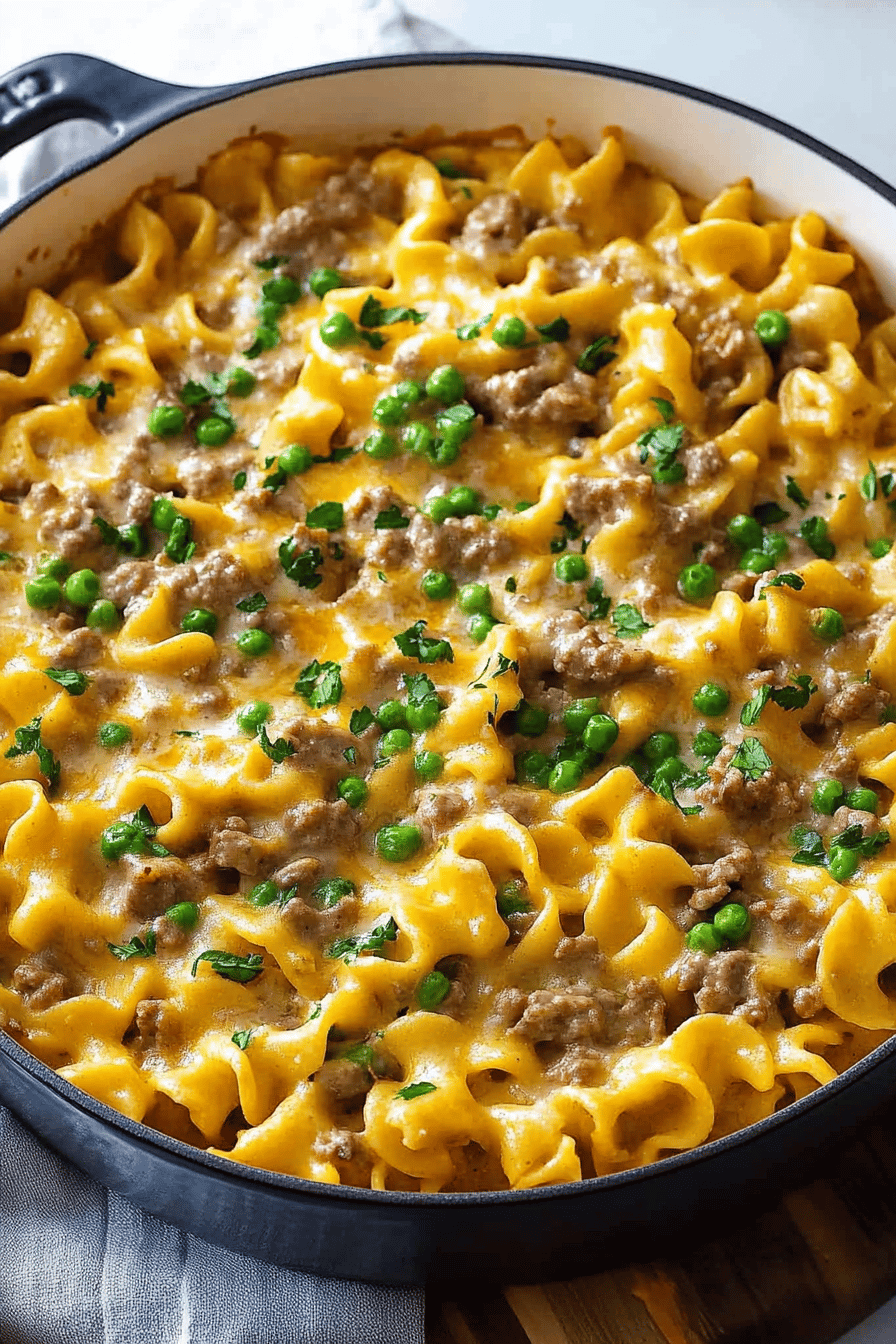 Ground Beef Stroganoff Casserole slice on plate showing perfect texture and swirl pattern