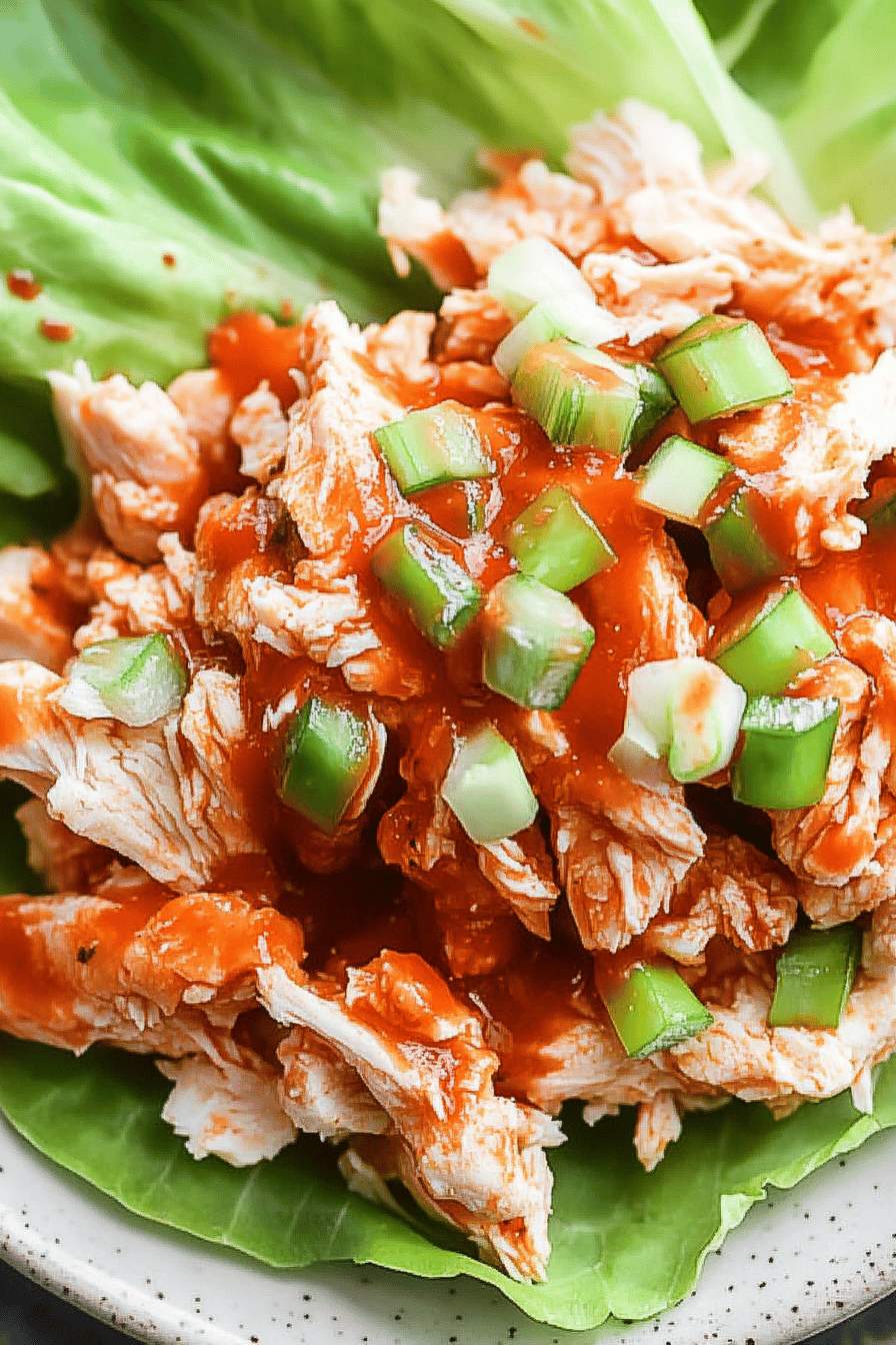 Buffalo chicken ingredients organized and measured on kitchen counter