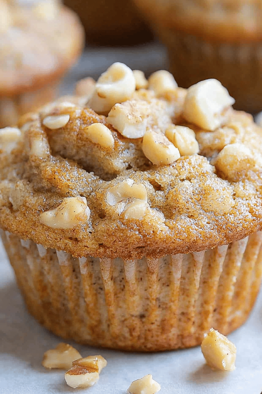 banana nut muffins slice on plate showing perfect texture and swirl pattern