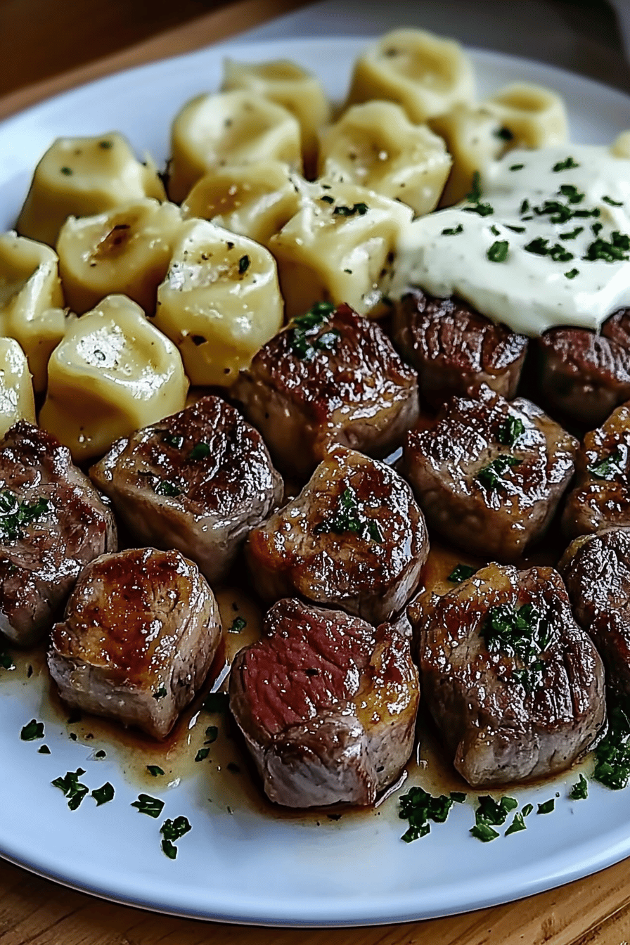 Garlic butter steak bites ingredients organized and measured on kitchen counter