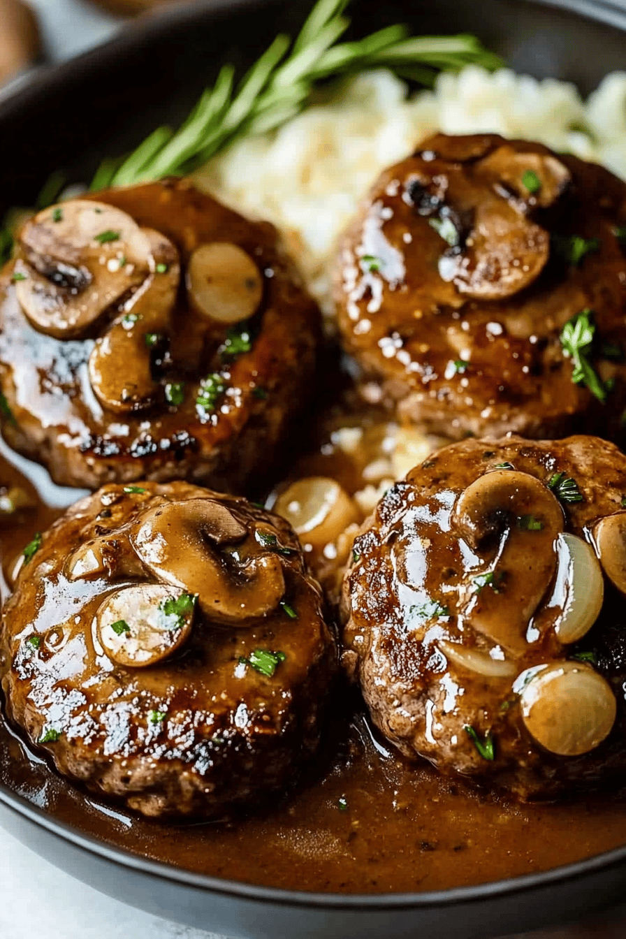 Salisbury steak recipe ingredients organized and measured on kitchen counter