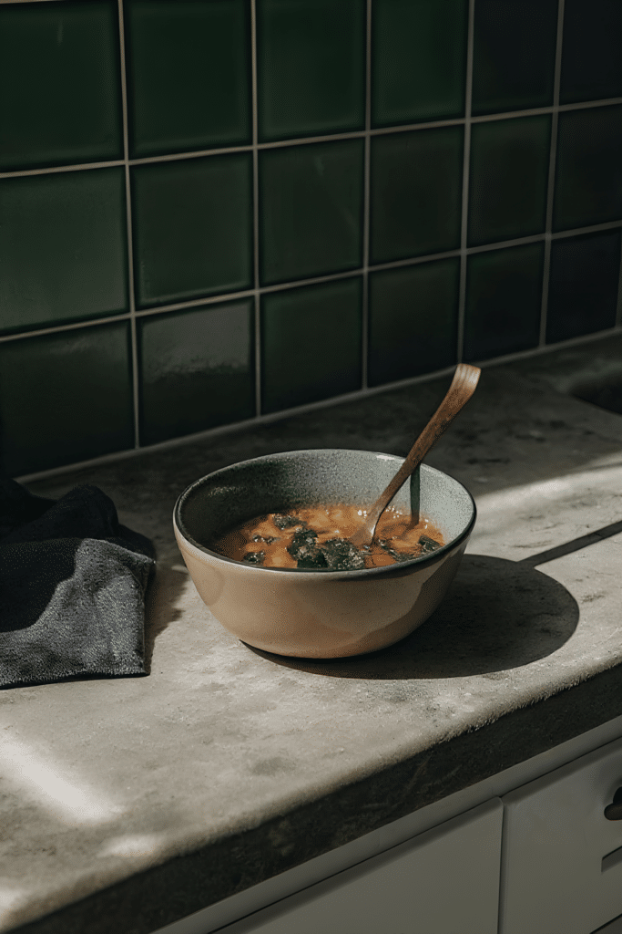 Finished Mediterranean lentil soup in the reserved kitchen scene
