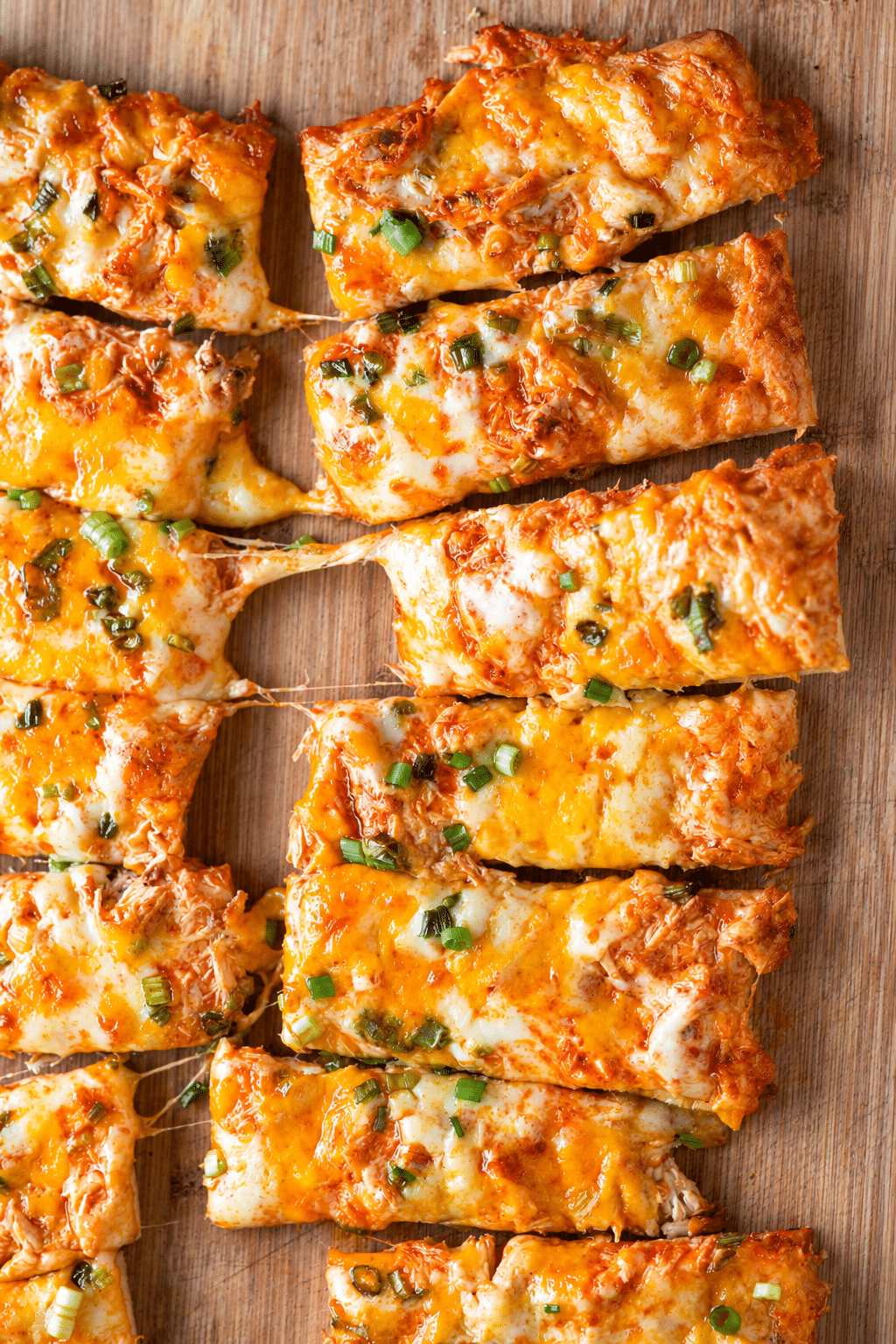 Buffalo chicken pizza sticks with melty cheese